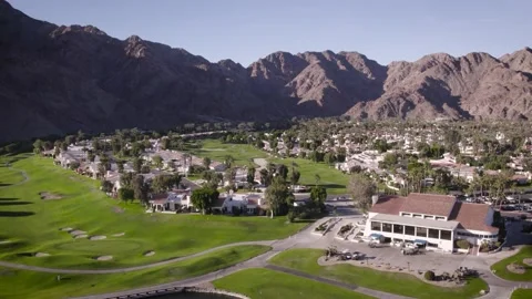 Desert Golf Course, Lake and Mountains Near Palm Springs, 4K Stock Footage 222629703