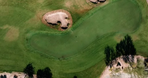 Desert Golf Course Putting Green Top Down Aerial Drone Double Bunker Pin Stock Footage 334351820