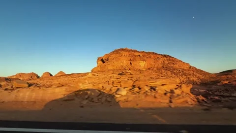 Desert highway landscape with car shadow captured from fast speed moving vehicle Video stock 327434321