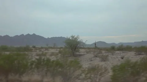 Desert highway with mountain backdrop in Arizona in slow motion 120fps Stock Footage 280068336