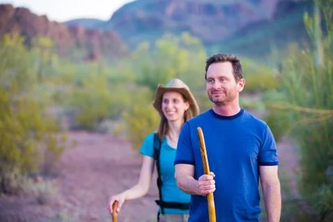 Desert Hikers on Mountain Path Stock Photos