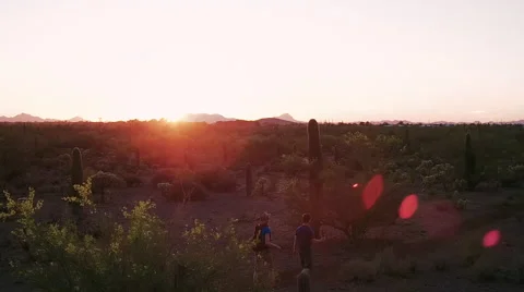 Desert Hikers at Sunset Stock Footage 64512526