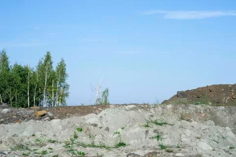 Desert landscape after mining activities. The destruction of forests due to t Stock Photos
