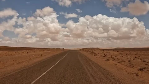 Desert landscape and fluffy cloudsriver view Stock Footage 279849427