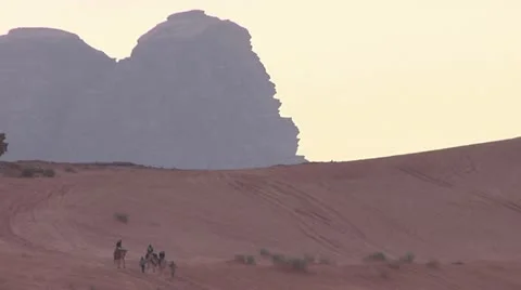 Desert Landscape, with Camel Riders Stock Footage 22018094