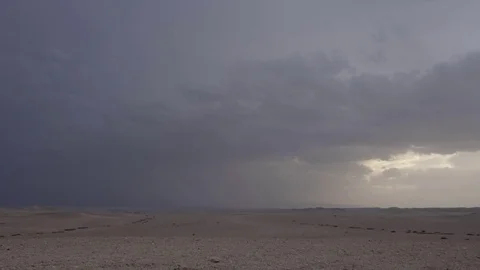 Desert landscape with dark clouds above Stock Footage 81238146