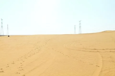 Desert Landscape with Distant Power Lines Stock Photos