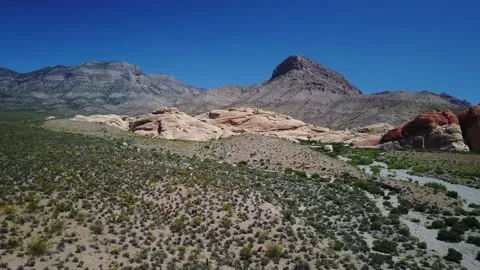 A desert landscape with mountains Stock Footage 155459275