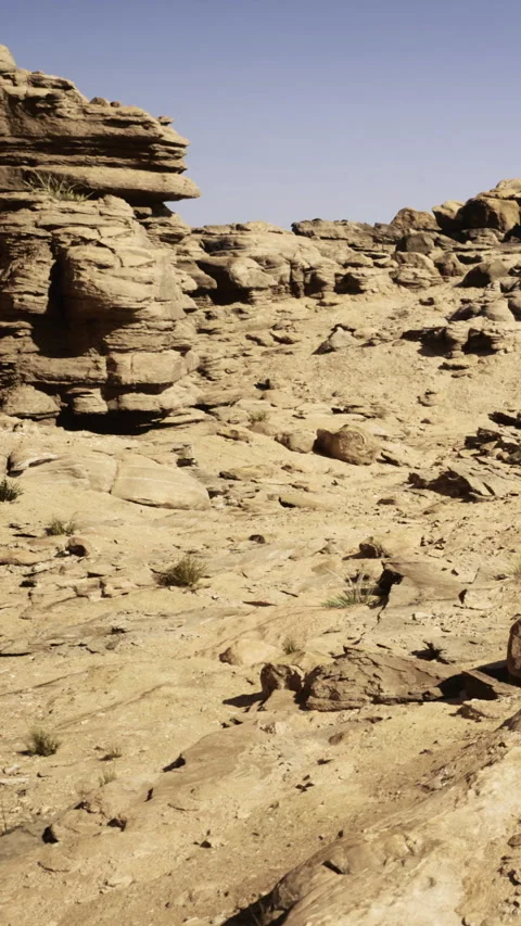Desert landscape with rock formations and dry soil during daytime hours Stock Footage 331440519