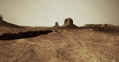 Desert landscape with rock formations under hazy sky at dusk Stock Illustration