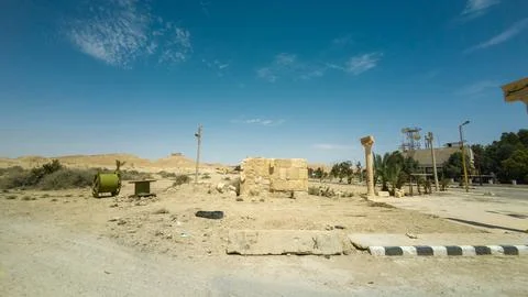 Desert Landscape with Scattered Structures Stock Photos