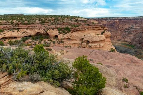 Desert landscape, view of red eroded rocks, Canyon de Chelly National Monum.. Stock Photos