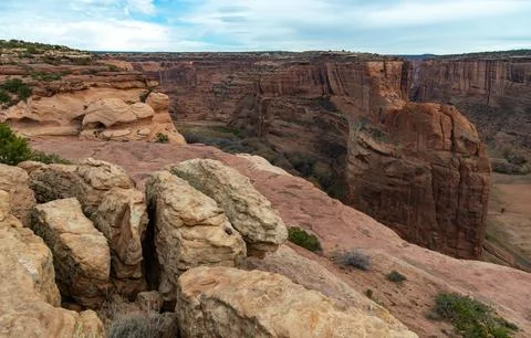 Desert landscape, view of red eroded rocks, Canyon de Chelly National Monum.. 스톡 사진