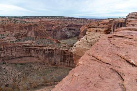 Desert landscape, view of red eroded rocks, Canyon de Chelly National Monum.. Stock Photos