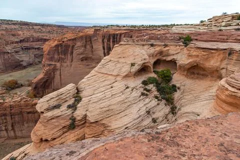 Desert landscape, view of red eroded rocks, Canyon de Chelly National Monum.. 스톡 사진