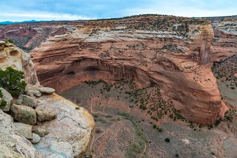 Desert landscape, view of red eroded rocks, Canyon de Chelly National Monum.. 스톡 사진