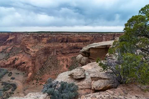 Desert landscape, view of red eroded rocks, Canyon de Chelly National Monum.. Photos