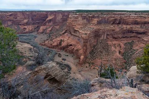 Desert landscape, view of red eroded rocks, Canyon de Chelly National Monum.. Stock Photos