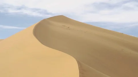 Desert Lines on a Dune blue sky sahara desert Morocco Stock Footage 128617251