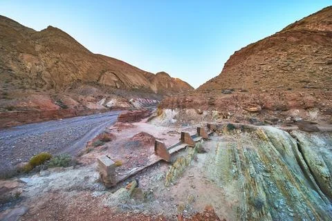Desert Mining Ruins and Eroded Hills in Nevada Canyon Landscape Stock Photos