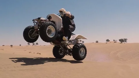 Desert motorcycle flying Stock Footage 122670367