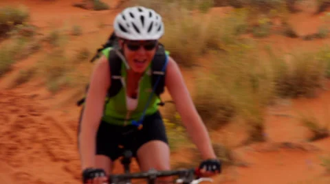 Desert Mountain Biking Rider Making Sandy Decent Video stock 25208439