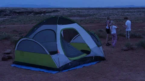Desert Mountain Biking Riders Brush Teeth Ready for Bed Stock Footage 25207754