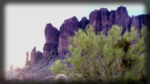 Desert Mountain with Dramatic Sun Glare Stock Footage 83178986