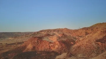 Desert orange hills drone fly in Stockbeeldmateriaal 85659088