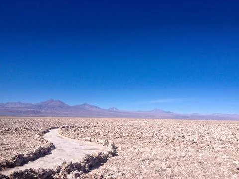 Desert path blue sky isolated Stock Photos