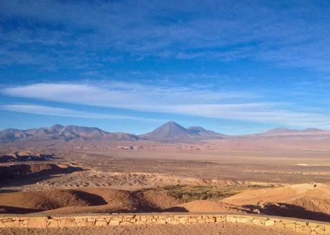 Desert path blue sky mountain Stock Photos