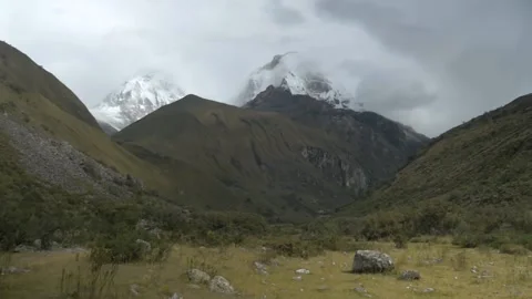  	Desert plain with a mountain in the clouds, on the Andes mountain range, in Pe Stock Footage 237173347