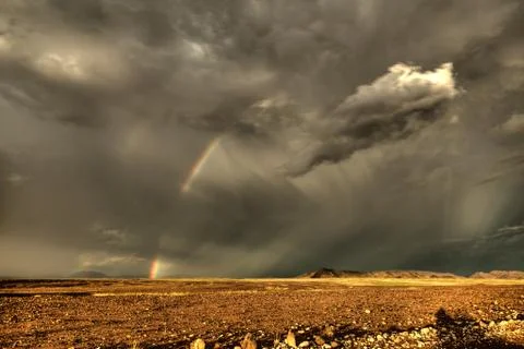 Desert rainbow Stock Photos