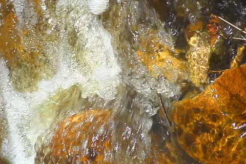 Desert River flowing over rocks Stock Footage 655526