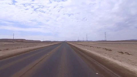 Desert road and mountains Stock Footage 77052203
