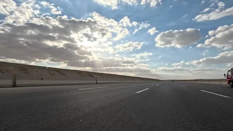 Desert Road Driving Between Cairo and Ain Sokhna Showing Continuous Traffic Flow Vídeos de archivo 330031804