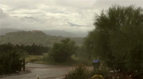 Desert Road in Heavy Rain Stock Footage 44418560