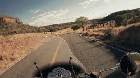 Desert road on motorcycle Stock Footage 61500678
