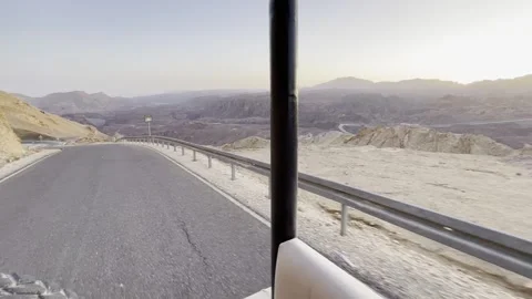 Desert Road Shot from the Back of a Moving Jeep with Wide Background Vistas  Vídeo Stock 238905358