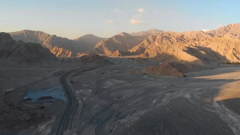 Desert Road through the Sandstone Rocks of Ras al Khaimah Stock Footage 108806342