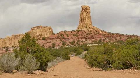 Desert road UTV driving toward camera stone monument - 4K UHD 0210 Stock Footage 49732049