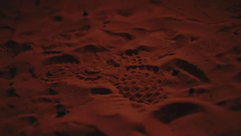 Desert sand dunes lit by pulsating firelight at night in Sahara Morocco Stock Footage 334513360