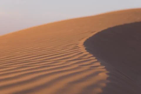 Desert Sand Dunes Pattern in Oman at Golden Hour Stock Photos