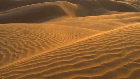 Desert sand dunes ripples in the wind. UHD, 4K Stock Footage 100285837