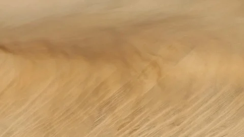Desert sand dunes with stormy winds and abstract sand movement and formations Stock Footage