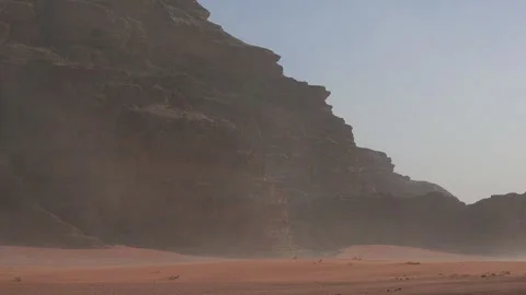 Desert Sandstorm. Sand waving in the wind in dunes in desert. Wadi Rum desert. V Stockbeeldmateriaal 262879072