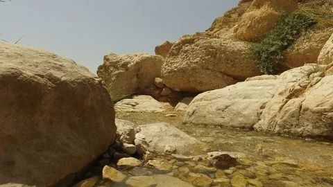 Desert Stream Flowing Through Boulders Stock Footage 77881191