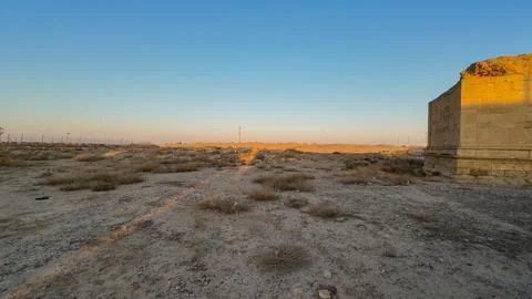 Desert Sunset with Ancient Stone Structure, Hatra Iraq Stock Photos