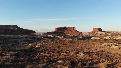 Desert Sunset Dawn Shot In Moab Utah sun ending a arid day with mesa in the Stock Footage