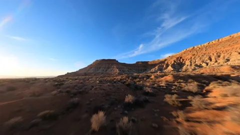 Desert Sunset Fast Flying Drone Shot Showing travel destination FPV Stock Footage 172118883